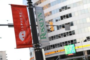 Artisphere and Rosslyn signs on a streetlamp