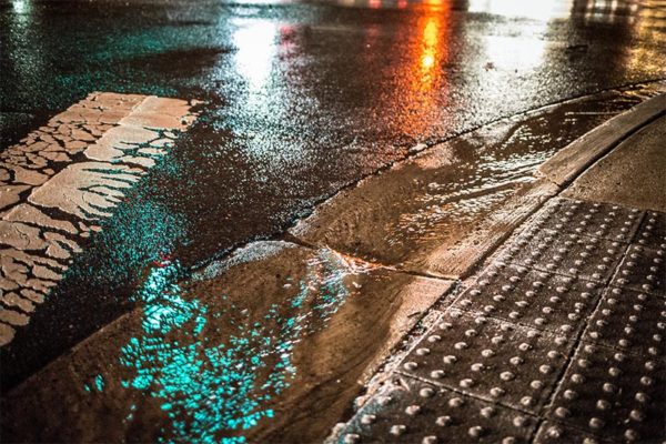 Rainwater near intersection of George Mason and Wilson Boulevard in Arlington Virginia January 30, 2013 by Ddimick