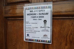 Sign on the front door of Crystal City Restaurant