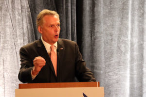 Terry McAuliffe speaks in front of Arlington Democrats