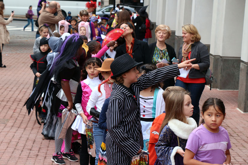 Elementary schoolers trick-or-treat in Courthouse