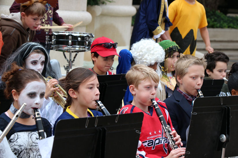 Elementary schoolers trick-or-treat in Courthouse