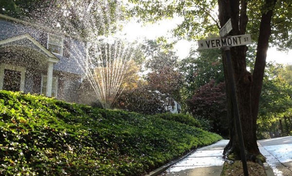 Watering a yard in north Arlington (Flickr pool photo by Lawrence Cheng Photography)