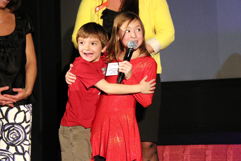 Tomorrow's Lemonade Stand co-founder Kylee Majkowski, right, and her younger brother