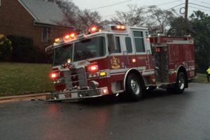 A fire truck sank into 17th Street N. while responding to a water main break Friday morning (photo courtesy Drew Stephens)