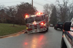 A fire truck sank into 17th Street N. while responding to a water main break Friday morning (photo courtesy Drew Stephens)