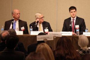 Arlington Economic Development's Alex Iams, left, speaks at the NAIOP economic development luncheon