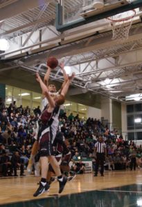 Dominique Tham shoots over a Mt Vernon defender