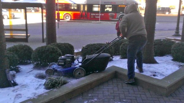 Workers mow the snow, for reasons unknown (photo courtesy Peter Golkin)