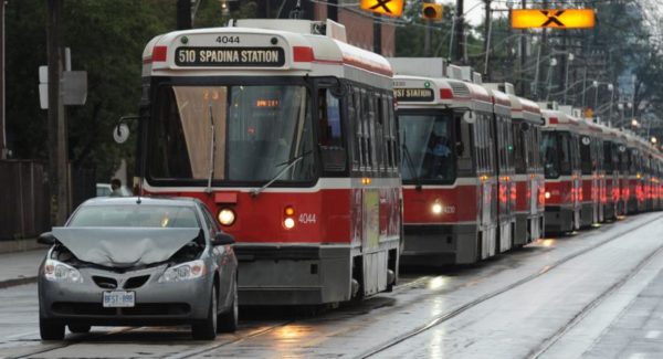 Streetcars in Toronto held up by a car accident (photo by Rick Eglinton/GetStock)