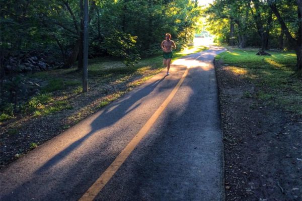 Shadowy jogger in Banneker Park (Flickr pool photo by Dennis Dimick)