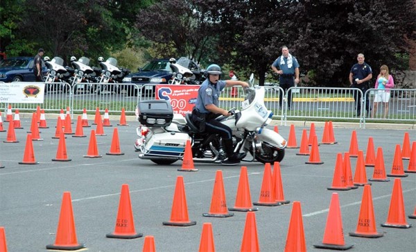 An ACPD motor officer participates in a police "motor rodeo" in Chantilly over the weekend (photo courtesy Danielle Newcombe Horvath)