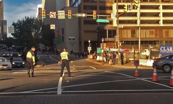 Police directing traffic at the intersection of Wilson Blvd and N. Lynn Street on the morning of 10/20/14