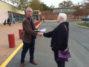 John Vihstadt greeting a voter outside the Walter Reed Recreation Center 11/4/14