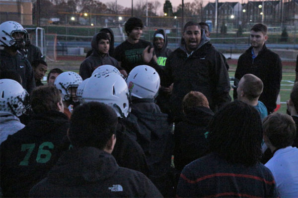 Wakefield football coach Wayne Hogwood talks to his team before the biggest game in school history