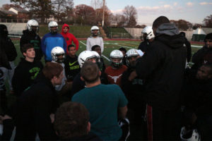 Wakefield football huddles around head coach Wayne Hogwood