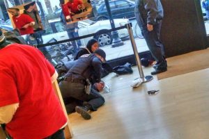 Man arrested in the Apple Store (photo courtesy Clayton Lott)