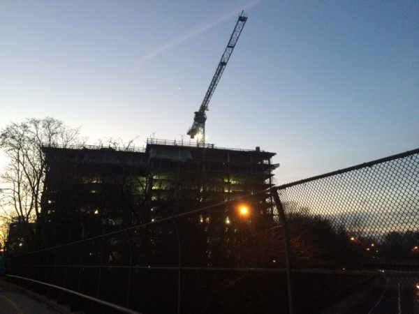 Apartment construction project on Lee Highway, at dusk