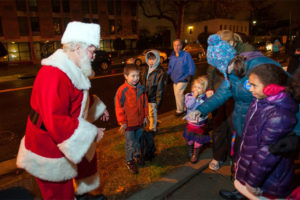 Santa greets children at the Miracle on 23rd Street (photo courtesy Linden Resources)