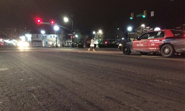 Brine pre-treatment on Columbia Pike Sunday night, as raindrops start falling