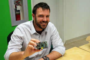 Dexter Industries Founder John Cole and the RaspberryPi computer that powers his robots