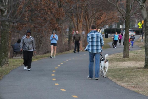 Residents take advantage of warm weather on a trail near Shirlington 3/11/15