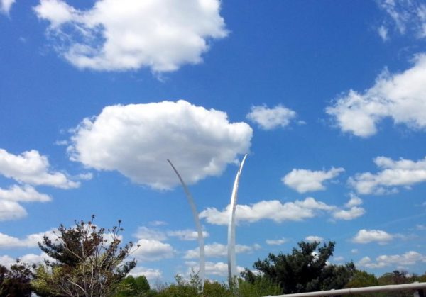 Fluffy white clouds above the Air Force Memorial (Flickr pool photo by ksrjghkegkdhgkk)