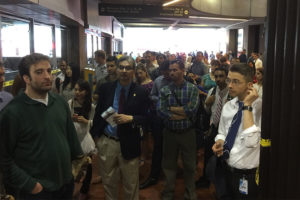 Crowd of commuters outside waiting outside the Rosslyn Metro station on Monday (Flickr pool photo by Alves Family)