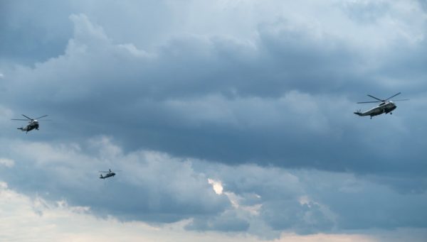 Marine helicopters flying below rain clouds (Flickr pool photo by John Sonderman)