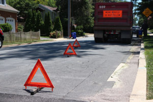 Dump truck and absorbent on N. Lexington Street.