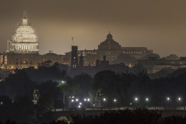 Foggy view of D.C., the Capitol and the Memorial Bridge from Arlington (Flickr pool photo by Kevin Wolf)