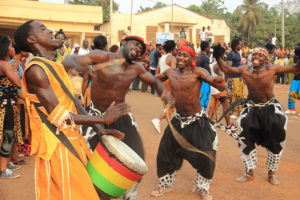 A Guinean man performs the traditional "strong man" dance: Dununba (Courtesy of Megan Morrison)