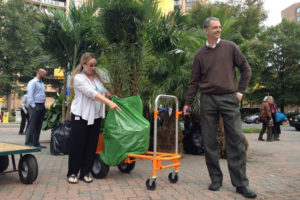 Two people take a tree home during the Crytal City's Bid Tropical Storm (Courtesy of Crystal City BID)