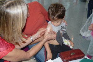 A child receives a flu shot (Courtesy of Arlington County)