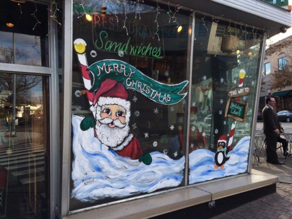 Christmas / Santa Claus illustration in the window of Whitlow's in Clarendon