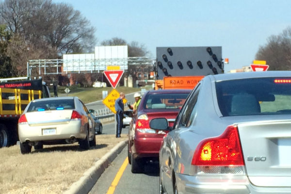 A VDOT pothole crew blocks traffic on the ramp from Washington Blvd to Route 50 for about 10 minutes on 3/8/16