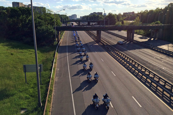 Police motorcycle officers / motorcade on I-395 on 5/13/16 (file photo)