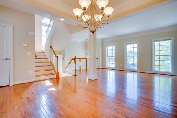 A Manchester Tan living room by Legacy Home Improvement Consultants