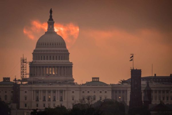 Cloudy sunrise behind the Capitol on 9/18/16 (Flickr pool photo by Kevin Wolf)