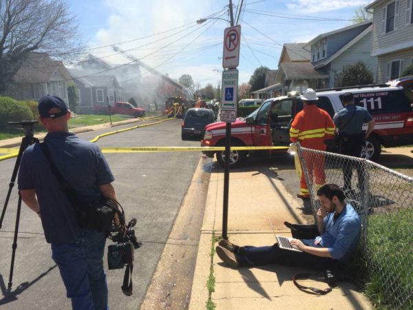 Ethan Rothstein reporting on a house fire in April 2015