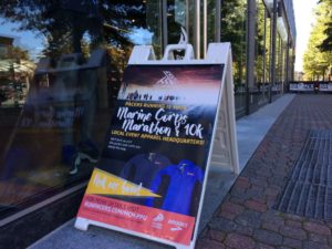 Marine Corps Marathon sign outside Pacers Clarendon store