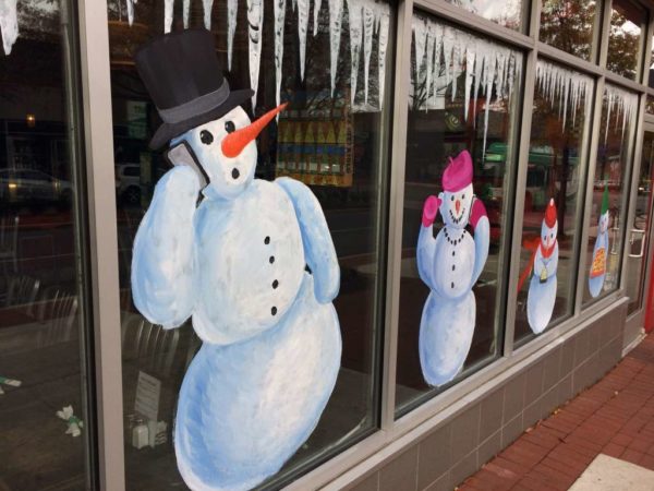 Snow man painted on a restaurant window in Shirlington