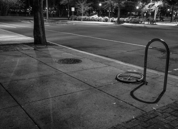 A bike tire is all that remains of a bike parked in Shirlington (Flickr pool photo by Erinn Shirley)