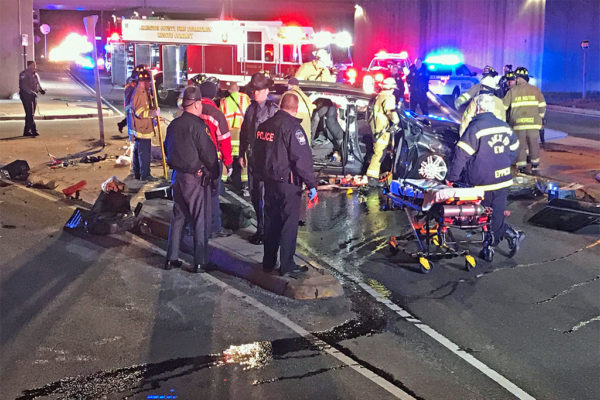 Rescuers work to free driver from SUV that fell off the side of a I-395 overpass near the Pentagon (courtesy photo)