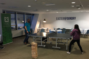 People playing table tennis at Eastern Foundry