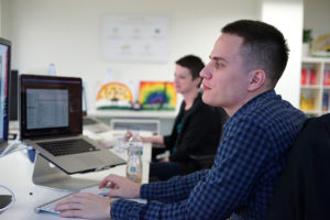 Workers in the Curiosity Media office, photo courtesy of Curiosity Media.jpg