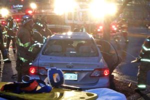 Firefighters work to extricate the driver of a vehicle involved in a critical accident on Glebe Road (photo courtesy @CAPT258)