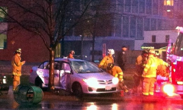 Firefighters work to extricate the driver of a vehicle involved in a critical accident on Glebe Road (photo courtesy "Dixie")