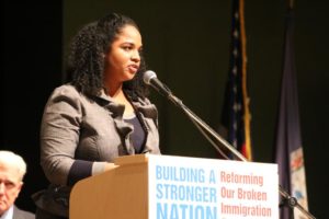 Gabrielle Jackson, speaking at a panel discussion on immigration at Kenmore Middle School