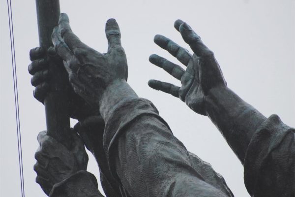 Hands at the Marine Corps War Memorial (Flickr pool photo by John Sonderman)